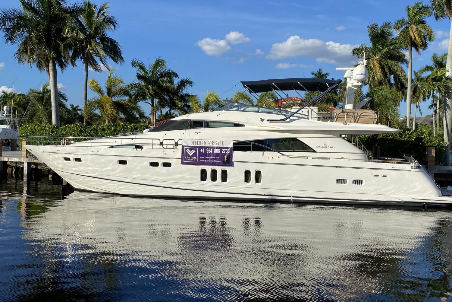docked yacht branded with lenton yachts sales collateral
