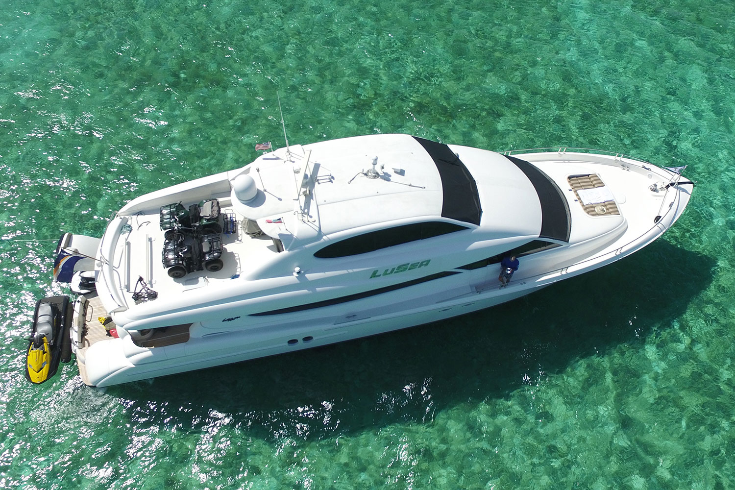 overhead of yacht docked in shallow water